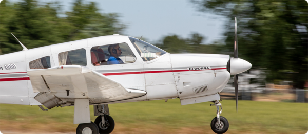 A student pilots and practices landing an aircraft.